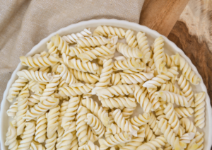 A plate full of IQF frozen fusilli pasta.